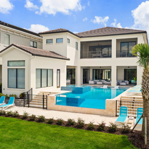 exterior of custom orlando home with luxury pool