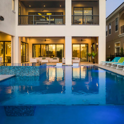 gorgeous outdoor pool and patio at luxury orlando home