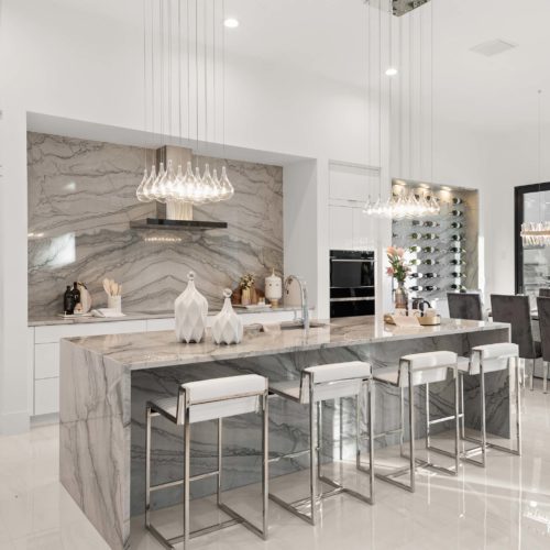 creative modern kitchen and dining space in new custom home